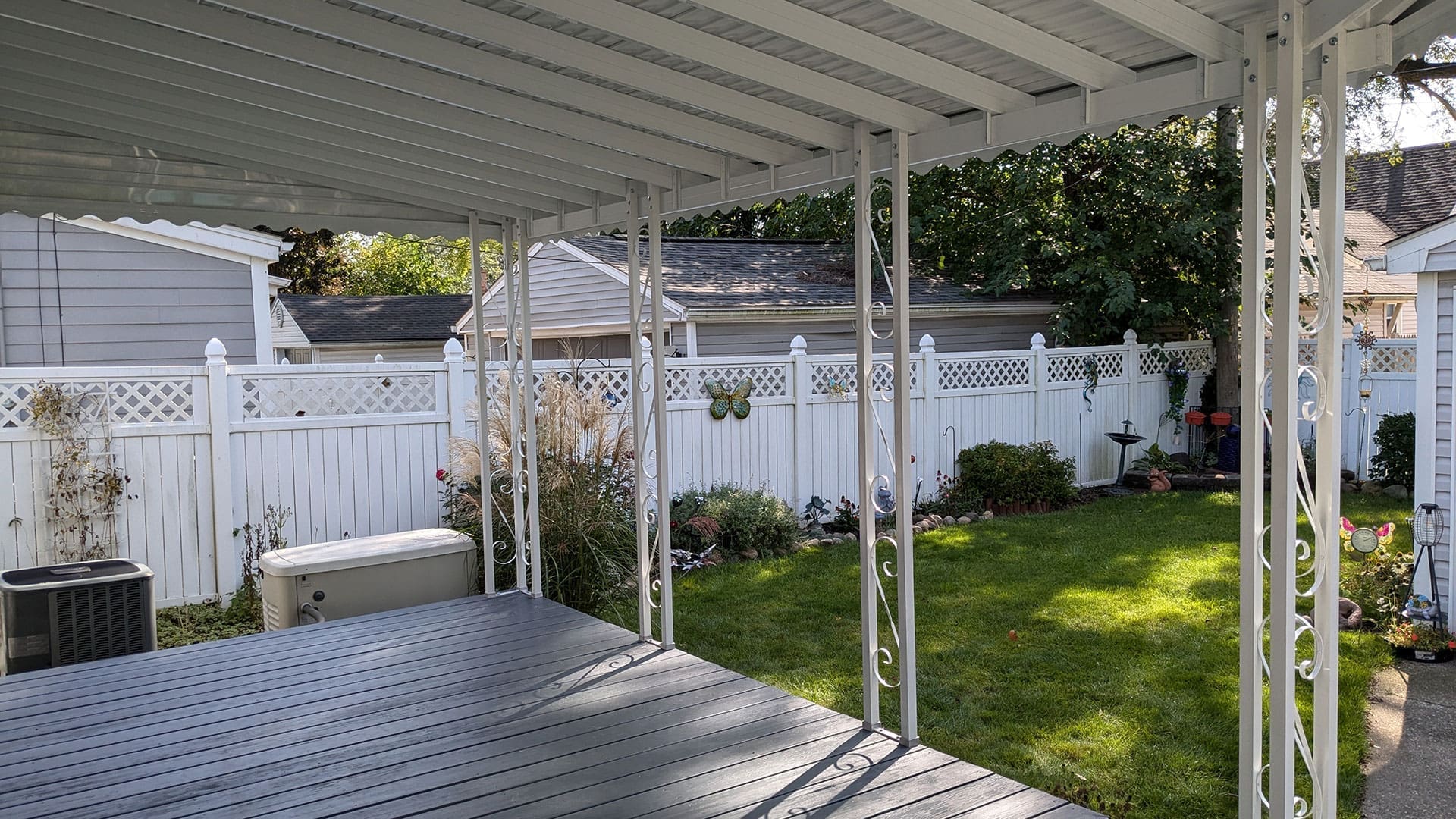 A Wayne Craft's residential, aluminum patio awning in the backyard of Detroit, Michigan home.