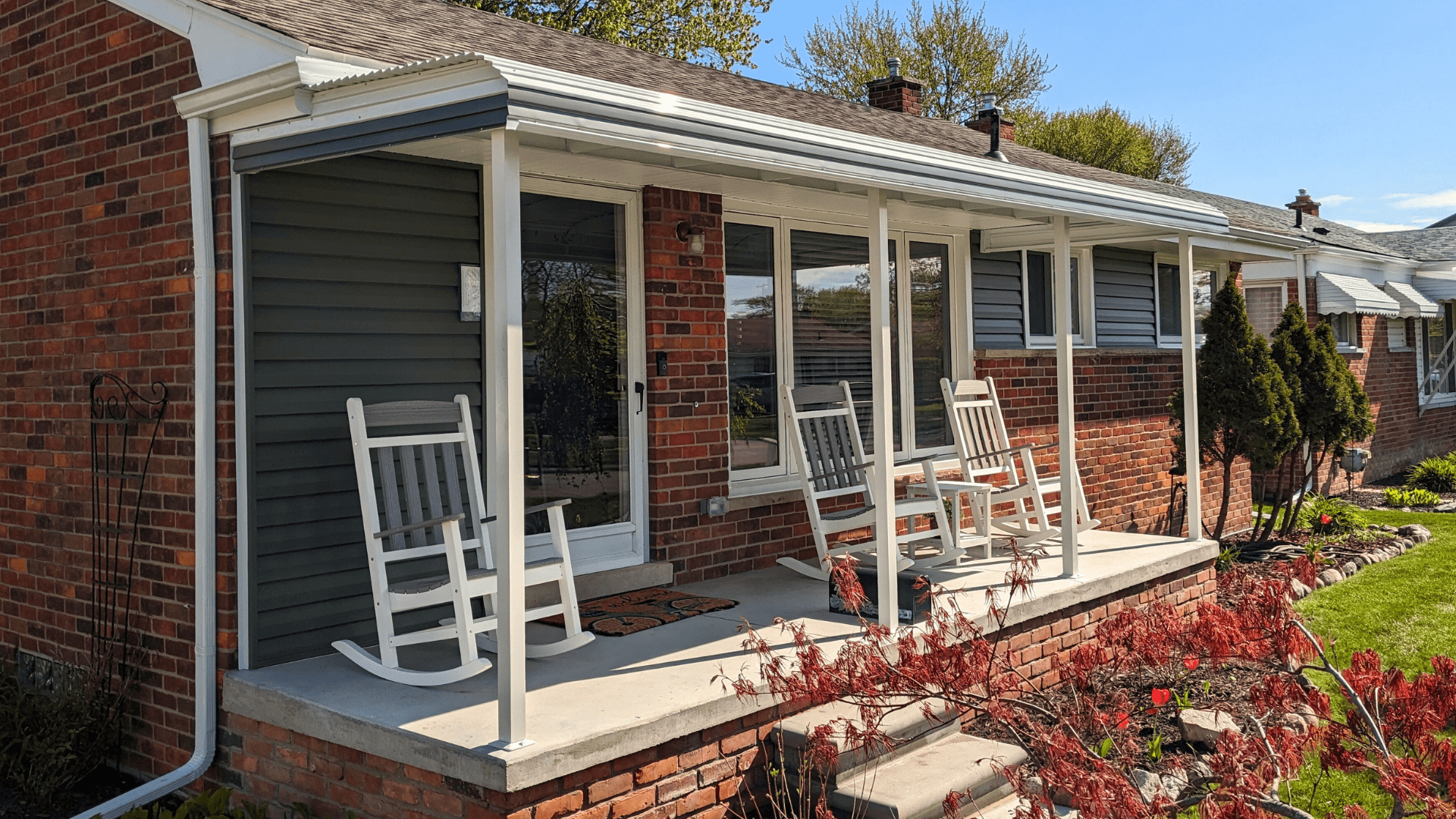 Front porch aluminum awning by Wayne Craft, providing stylish protection from the elements